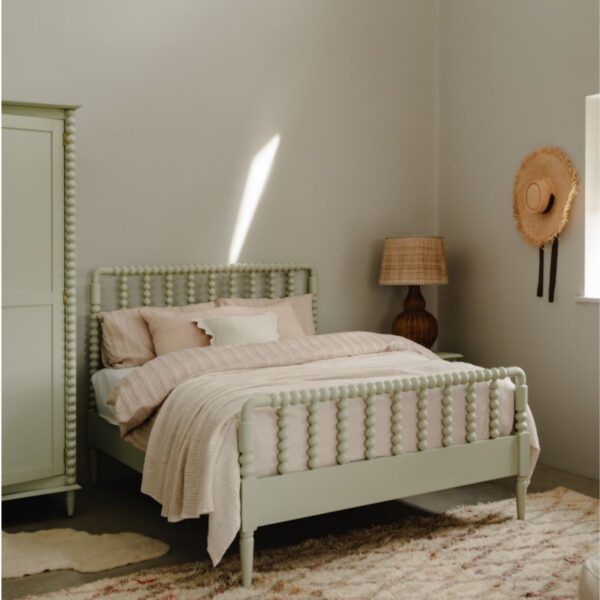 King sized bobbin style bed in pale olive