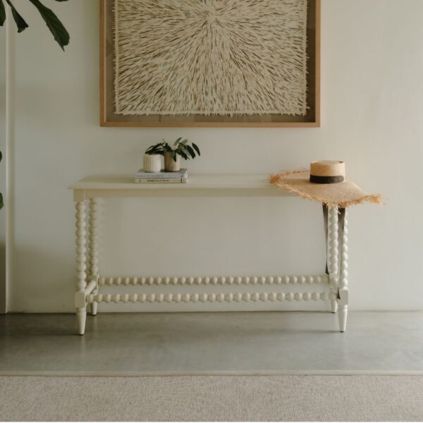 Large Bobbin style console table in a cream painted finish