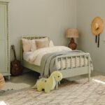 UK single bed frame in a kids bedroom showing space-saving layout