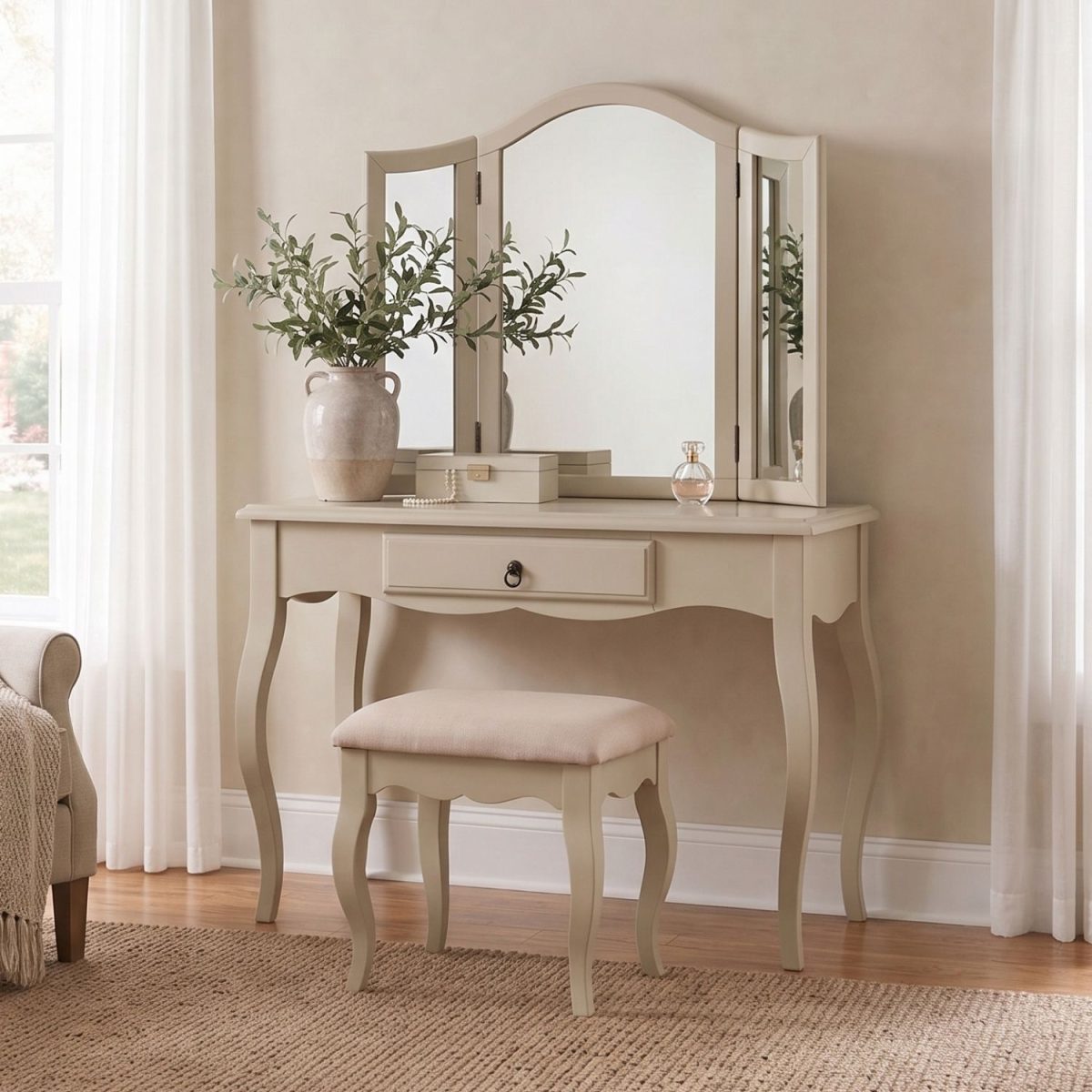 Romance beige dressing table featuring a single drawer with an antique brass handle and sweeping French Rococo curved legs.
