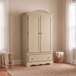 Romance beige wardrobe with drawers featuring a curved top frieze, two doors, a deep bottom drawer, and antique brass handles.
